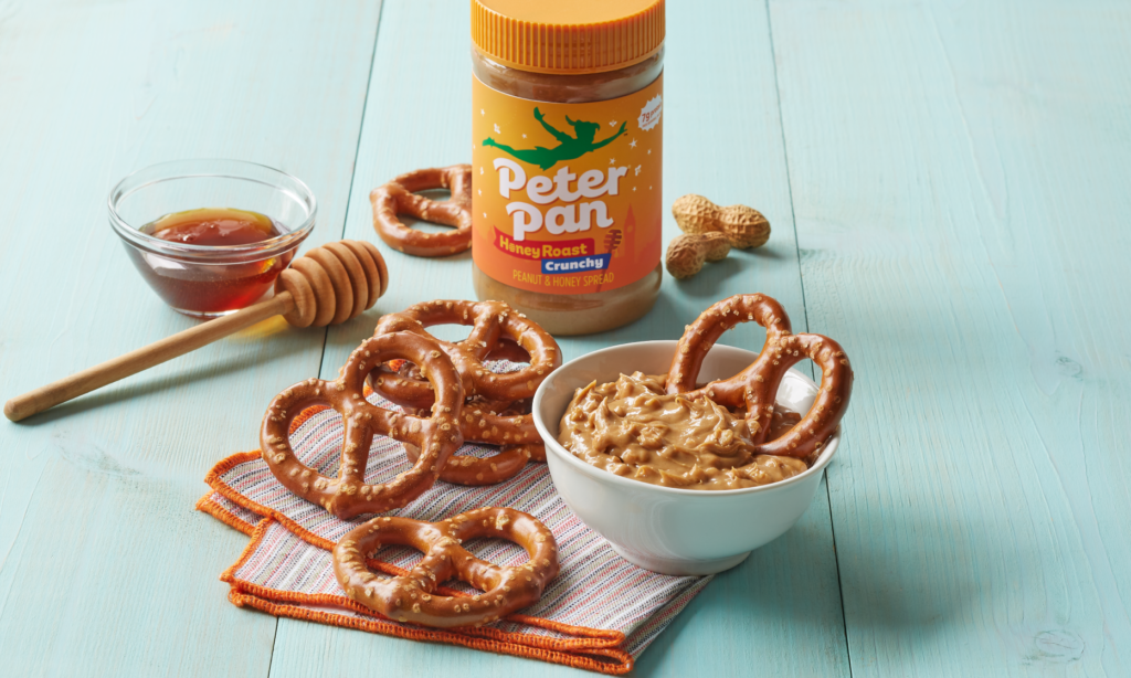 Peter Pan Honey Roast Crunchy Peanut Butter served with pretzels